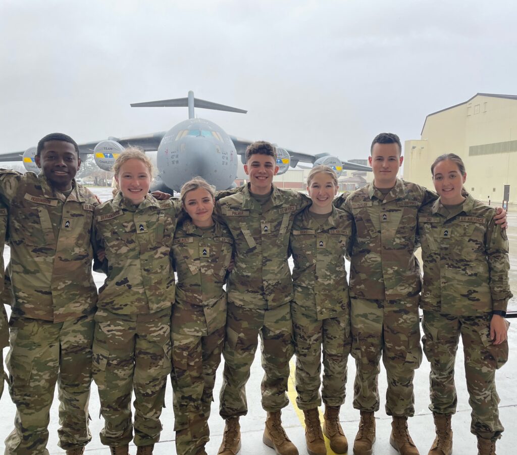 Cadets in front of a C-17 on a base visit to Joint Base Charleston. 